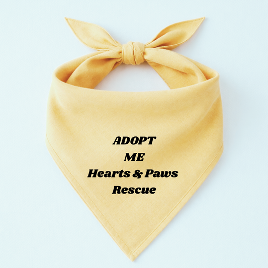 Yellow bandana with 'ADOPT ME Hearts & Paws Rescue' text on a white background